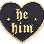 Pin "he/him", black heart